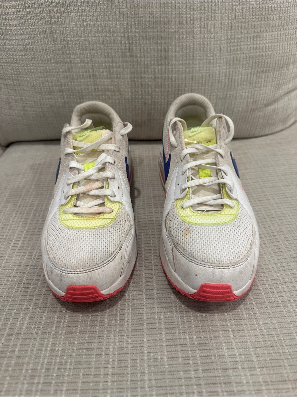 Nike White Sneakers with Neon Yellow, Blue, and Pink Accents